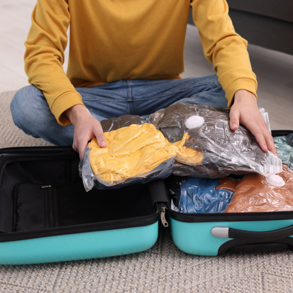 Woman packing with vacuum bags